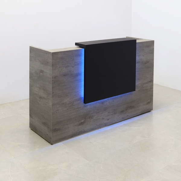 72-inch Chicago Custom Reception Desk in black traceless laminate counter and concrete PVC desk, with color LED, shown here.