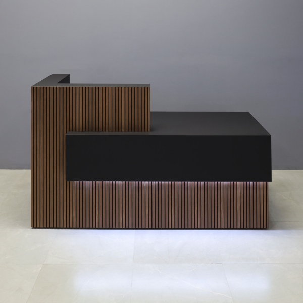 72-inch Atlanta Custom Reception Desk with the countertop & base on the left side when facing front covered in walnut & black tambour, while the workspace and front panel are covered in black traceless laminate, and warm white LED.