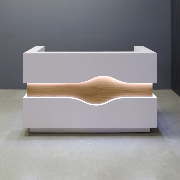 72-inch Wave Reception Desk in white matte laminate main desk, white oak waved accent, brushed aluminum toe-kick, and warm white LED.