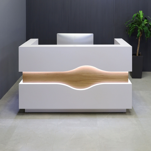 72-inch Wave Reception Desk in white matte laminate desk and counter, white oak veneer wave accent front, and brushed aluminum toe-kick, with warm white LED, shown here.