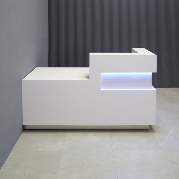 72-inch Manhattan ADA Compliant Custom Reception Desk in white matte laminate main desk, field elm matte laminate accent and brushed aluminum laminate toe-kick, with white LED shown here.