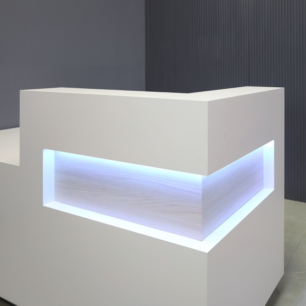 72-inch Manhattan ADA Compliant Custom Reception Desk in white matte laminate main desk, field elm matte laminate accent, brushed aluminum laminate toe-kick, and warm white LED.