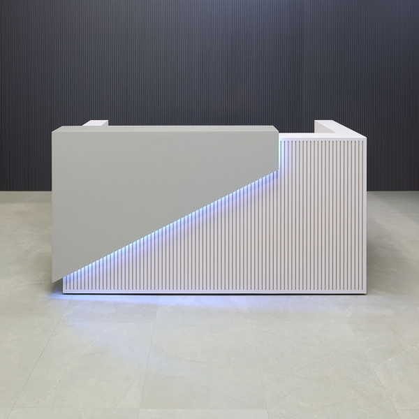 84-inch Miami Custom Reception Desk in fog gray laminate counter, white gloss laminate grooved front panel and desk, with color LED shown here.