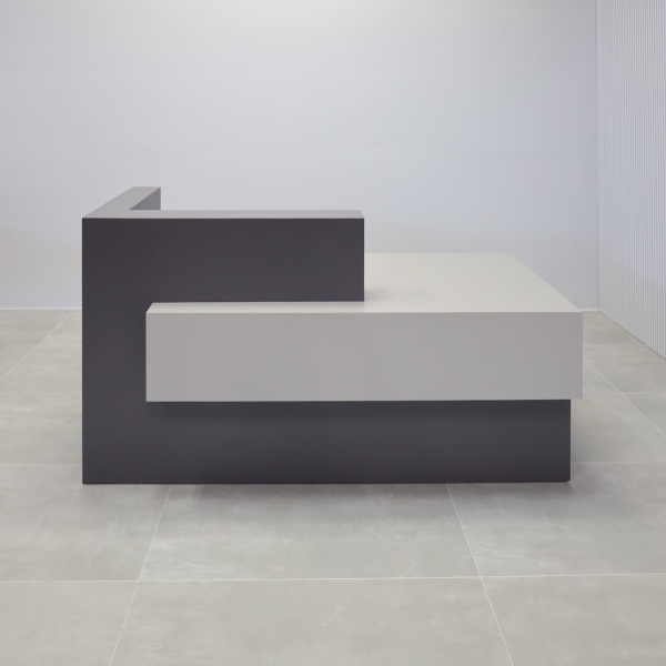 84-inch Atlanta Custom Reception Desk with the countertop & base on the left side when facing front covered in storm gray matte laminate, while the workspace and front panel are covered in fog gray matte laminate.