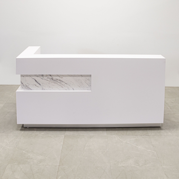 84-inch Manhattan L-Shape Custom Reception Desk in calcutta stone pvc accent panel, white matte laminate main desk and brushed aluminum toe-kick, shown here.