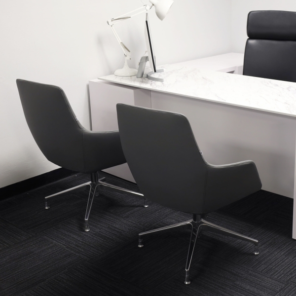 Silla Guest and Lobby Chair in gray leatherette, shown here.